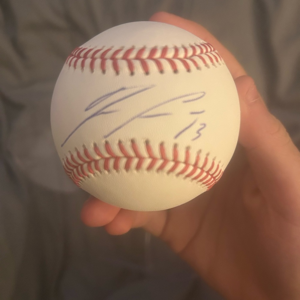 Autographed 2021 Ronald Acuña jr ball with authentication sticker and case